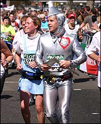 Dorothy and the tin-man try to catch up with the cowardly lion