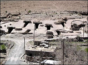 Holes in ground where water is piped through 