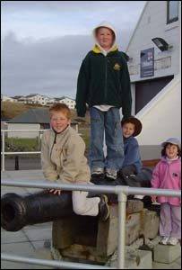 Four Australian visitors to Wales - Simon, Ian, AJ and Jenna Merrigan - at Trearddur Bay Lifeboat Station