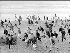 Crowd running on the beach 
