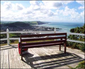 Julie Bosworth, from Ontario in Canada, sat at the top of Aberystwyth's Constitution Hill, enjoying the view