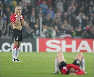 PSV's dejected players at the final whistle