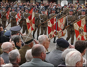 World War II veterans salute wartime army flags in Warsaw, Poland (7 May, 2005)