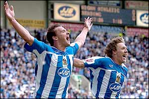 Wigan's Lee McCulloch celebrates putting his side ahead against Reading