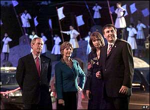 George W Bush and wife Laura stand with Georgian President Mikhail Saakashvili and his wife Sandra Roelofs