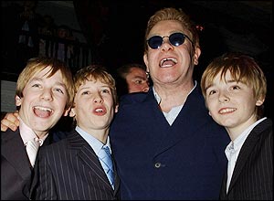(l-r) James Lomas, George Maguire, Elton John and Liam Mower