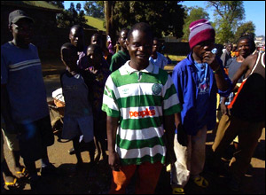 A young boy in the Malawi capital, Lilongwe, sports a Celtic strip during First Minister Jack McConnell's visit