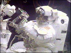 Astronaut carrying out repairs