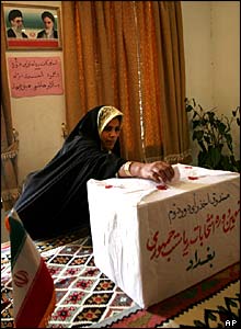 Iranian woman voter casts her ballot at the Iranian Consulate in Baghdad, Iraq.