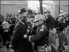 State trooper and demonstrator face each other on Selma-Montgomery march