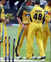 Brett Lee is congratulated after bowling Tushar Imran first ball