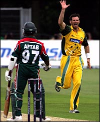 Aftab Ahmed is dismissed for seven with the score on 75-5