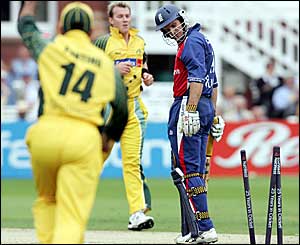 Andrew Strauss surveys the damage caused by a Brett Lee delivery