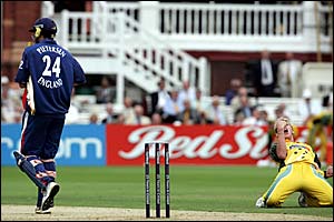 Kevin Pietersen trudges off after edging Brett Lee (right) to Adam Gilchrist