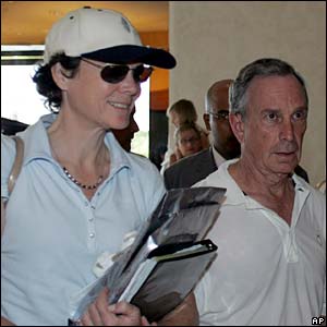 New York City Mayor Michael Bloomberg, right, and his companion Diana Taylor arrive in Singapore