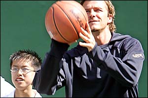 David Beckham plays basketball