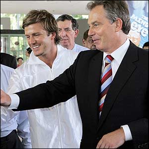 British Prime Minister Tony Blair joins David Beckham at the Singapore Science Centre