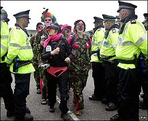 Protesters dressed as clowns