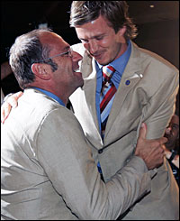 Britain's greatest Olympian Sir Steve Redgrave celebrates with England football captain David Beckham