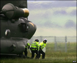 Riot officers arriving by helicopter