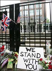 Union jack, poster and flowers outside the British Embassy in Washington DC