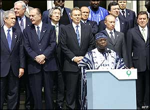 President Olusegun Obasanjo of Nigeria (centre) gives a G8 statement at the summit in Gleneagles 