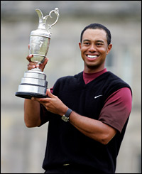 Tiger Woods holds up the Open trophy