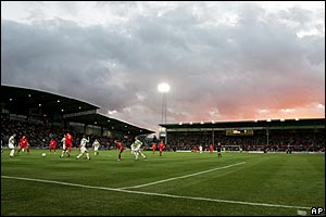 A good size crowd at Wrexham watch the David versus Goliath clash