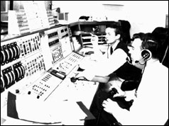 John Saxon (left) and Deputy Controller Mike Dinn (right) at the console