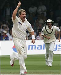 Shane Warne celebrates the wicket of Marcus Trescothick