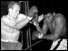 Henry Cooper and Cassius Clay exchange blows