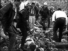 victim on ground and rescue workers 