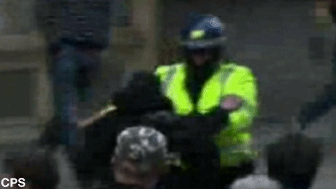 Video footage recorded at the G20 protests in London on 1 April 2009 shows the moment PC Simon Harwood tried and failed to arrest a protester for scrawling graffiti on a police carrier.