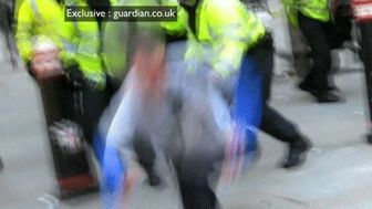 Video footage from 1 April 2009 shows Ian Tomlinson being turned away from a line of officers in Royal Exchange Passage, London and struck with a baton before being pushed over.