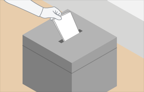 A ballot paper being put in a ballot box