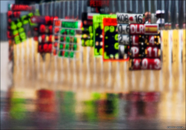 Pit boards in the heat haze during the Hungarian Grand Prix