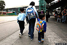 A woman with children