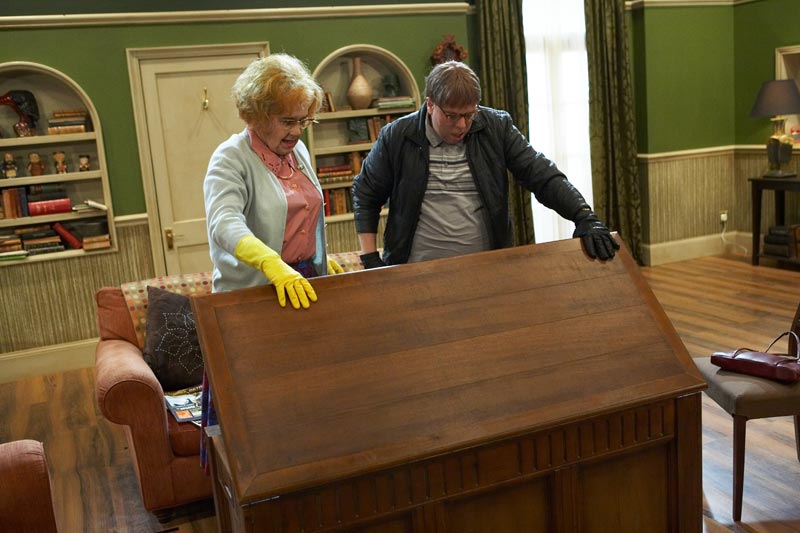 David and Maureen look in a box