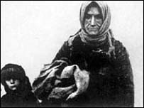 Селянка з дитиною