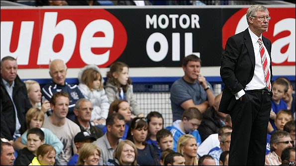 Manchester United manager Sir Alex Ferguson watches his side at Goodison Park