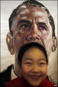 Chinese girl in front of Obama portrait