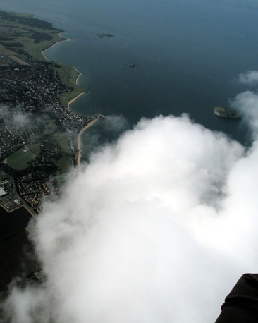 The East Lothian coastline, taken while cloud-hopping 4,500 feet above.
