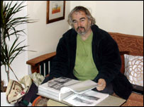 Alan looking at photo album
