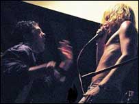 Singer on stage with fan