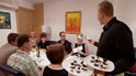 Waiter serving at table