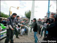 The Racing Green team celebrate reaching their final destination, Ushuaia in Argentina