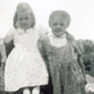 Anne (on the left) with her cousin Sally Conway. The picture was taken at the back of the house mentioned in the story