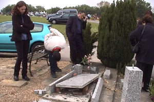 Mike was coming back from his father's memorial service when he heard the grave had been desecrated