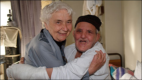 Dr Pfau (left) with a patient at the Marie Adelaide Leprosy Centre in Karachi, Pakistan