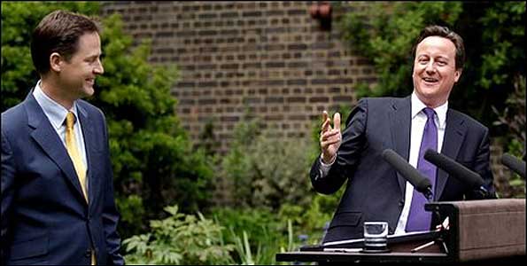 Nick Clegg and David Cameron in rose garden